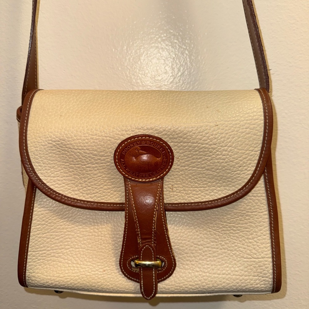 Cream and Brown Leather Dooney and Burke purse.